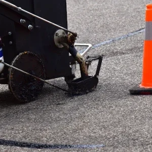 Crack-Sealing1 Asphalt crack sealing in Tennessee by Greene’s Parking Lot Management